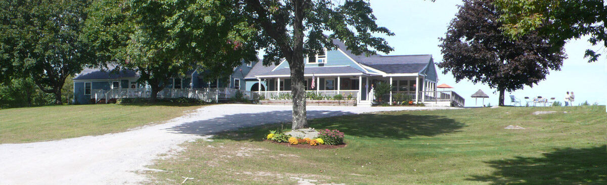 outside photo of the blue house